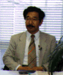 A portrait of Michiaki Yasumura.